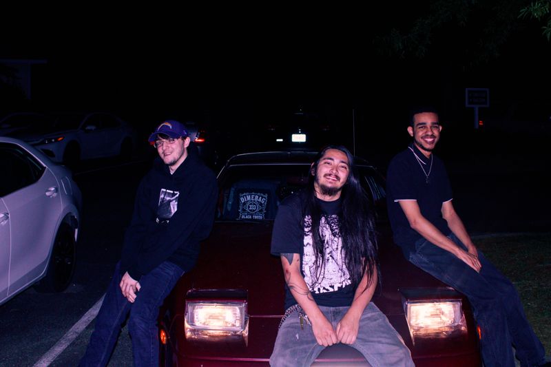 Headlights and a crowd. Photograph by Isaiah Sanchez.
