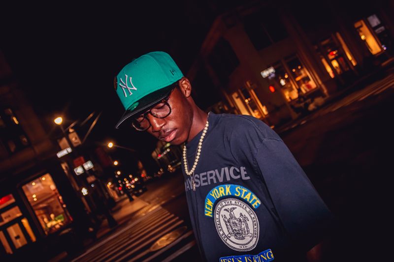Green hat, warm light. Photograph by Isaiah Sanchez.