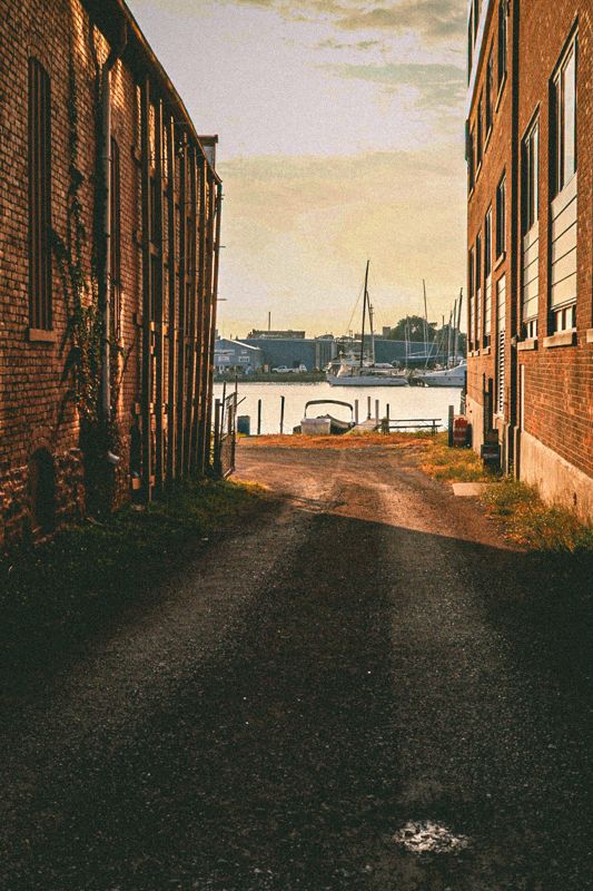 Brick alley to the water. Photograph by Isaiah Sanchez.