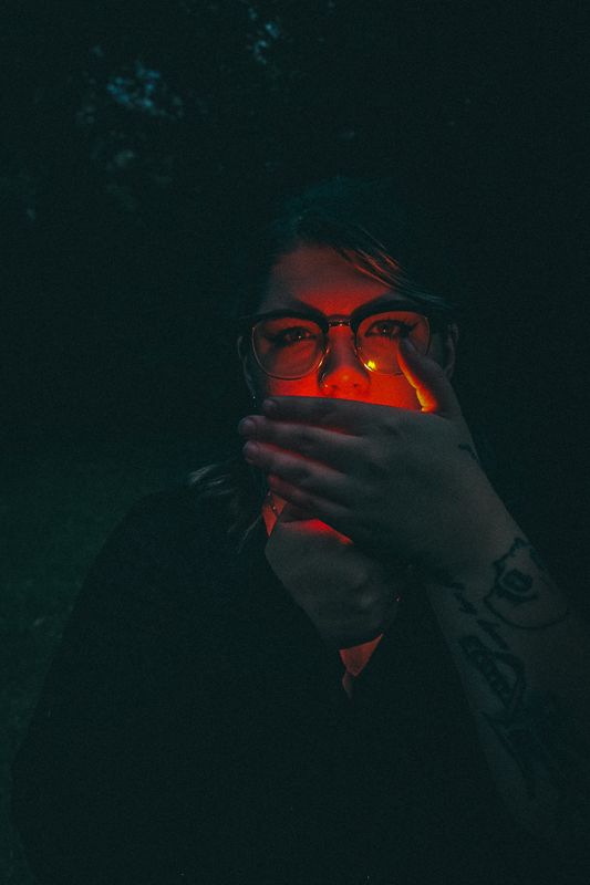 Red light, a hand. Photograph by Isaiah Sanchez.