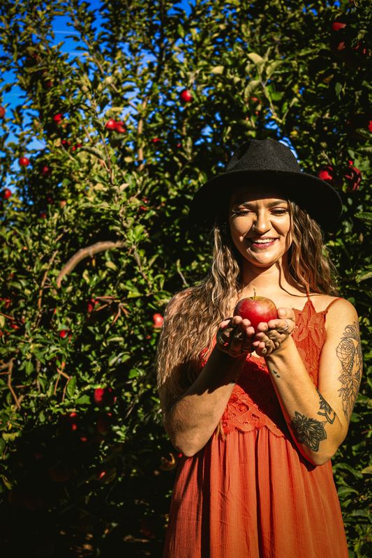 Red dress and hat. Photograph by Isaiah Sanchez.