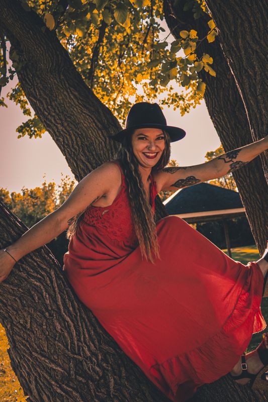 Red dress in the tree. Photograph by Isaiah Sanchez.