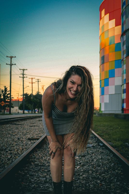 Laughing on the tracks — from Michigan. Photograph by Isaiah Sanchez.