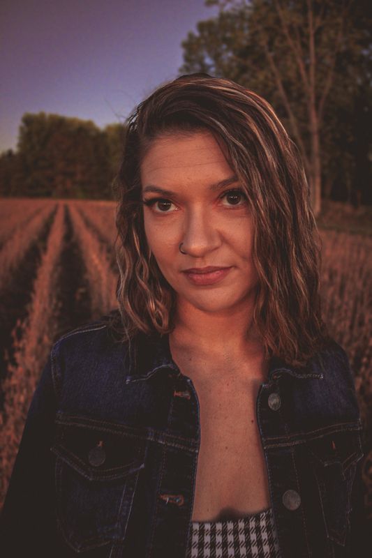 Field light on her face — from Michigan. Photograph by Isaiah Sanchez.