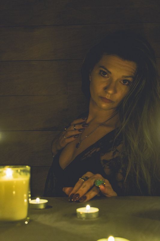 A candlelit table — from By Candlelight. Photograph by Isaiah Sanchez.
